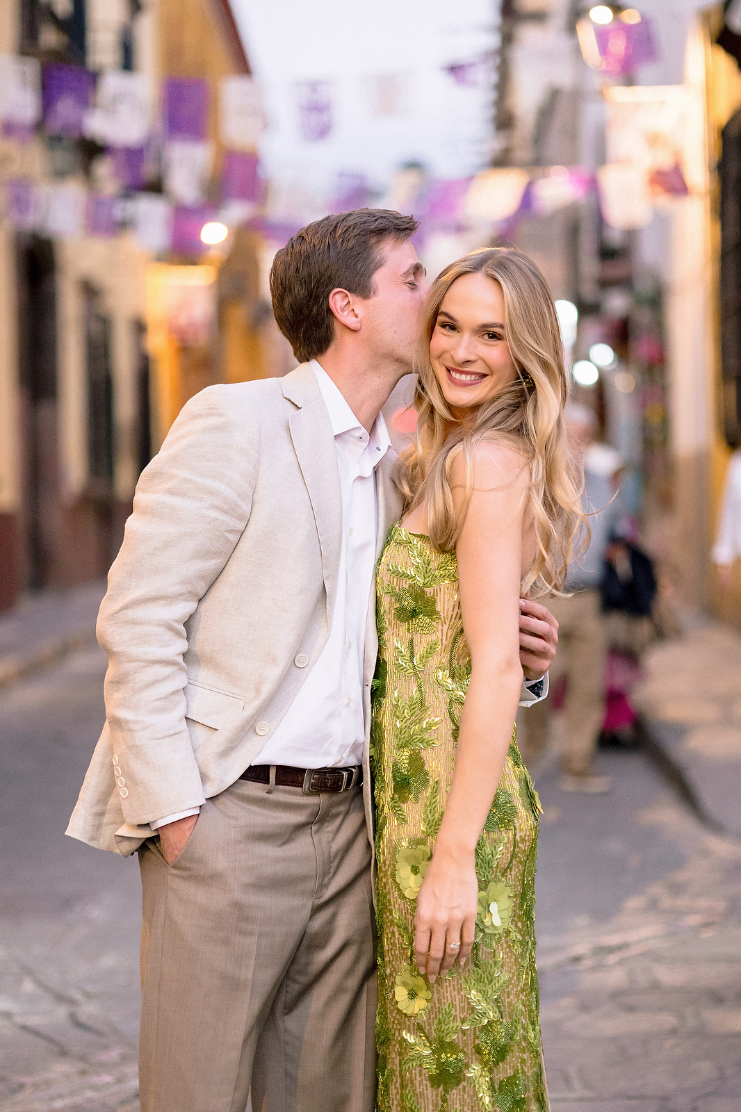 Chloe and Jett in the streets of San Miguel de Allende with papel picado