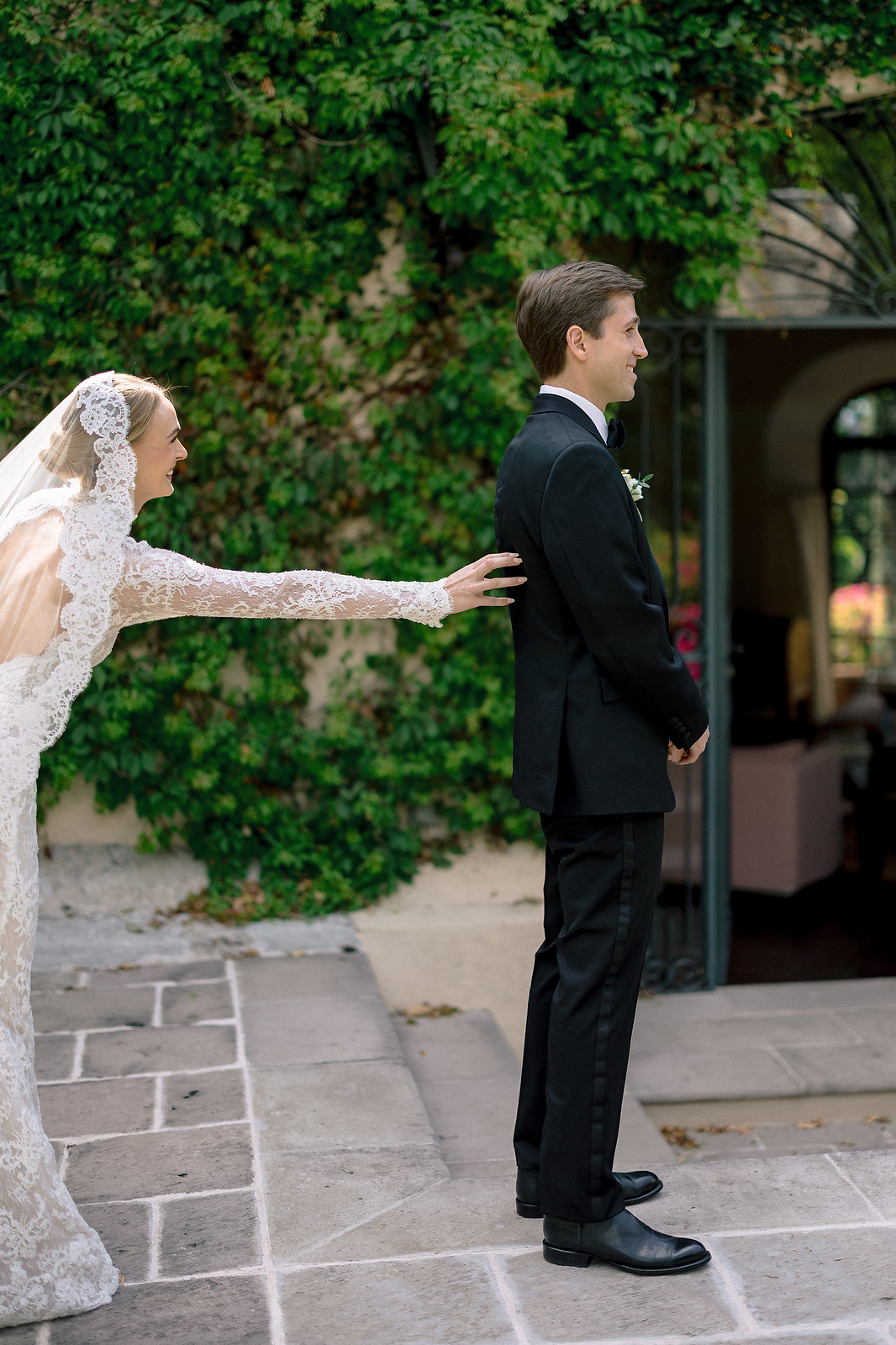 Bride reaching for groom during first look at San Miguel de Allende
