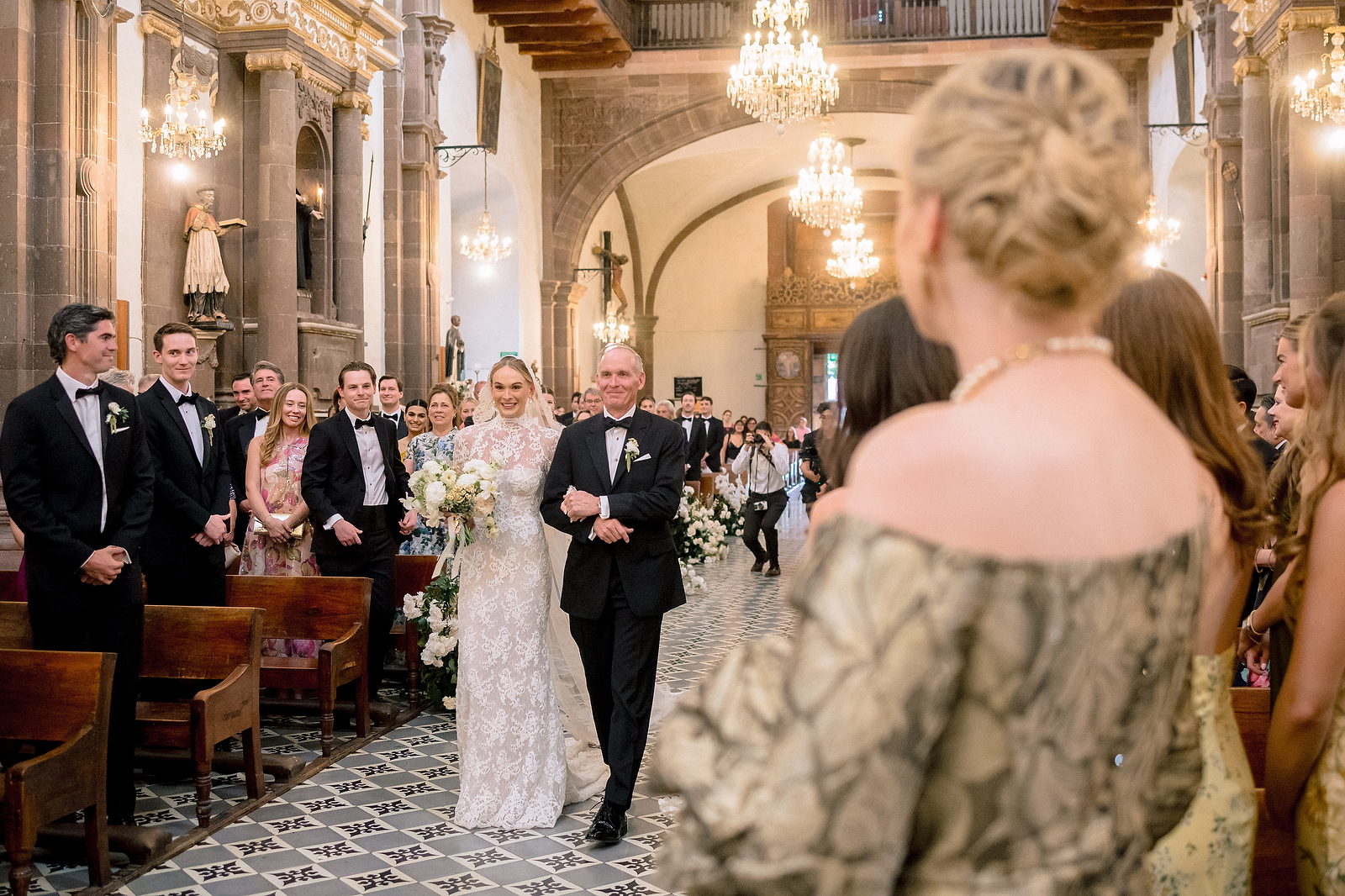 Bride and father walking down the aisle at San Miguel de Allende cathedral