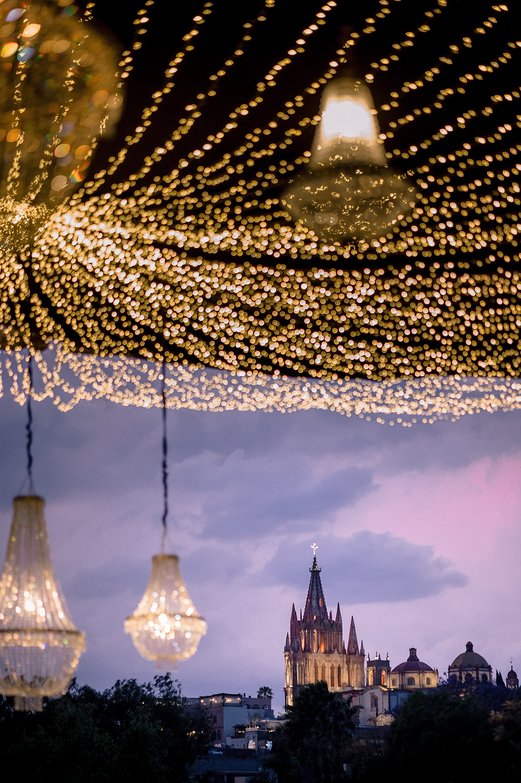 Crystal chandeliers and fairy lights with Parroquia de San Miguel Arc&aacute;ngel at twilight  -  Marco Wang Photography