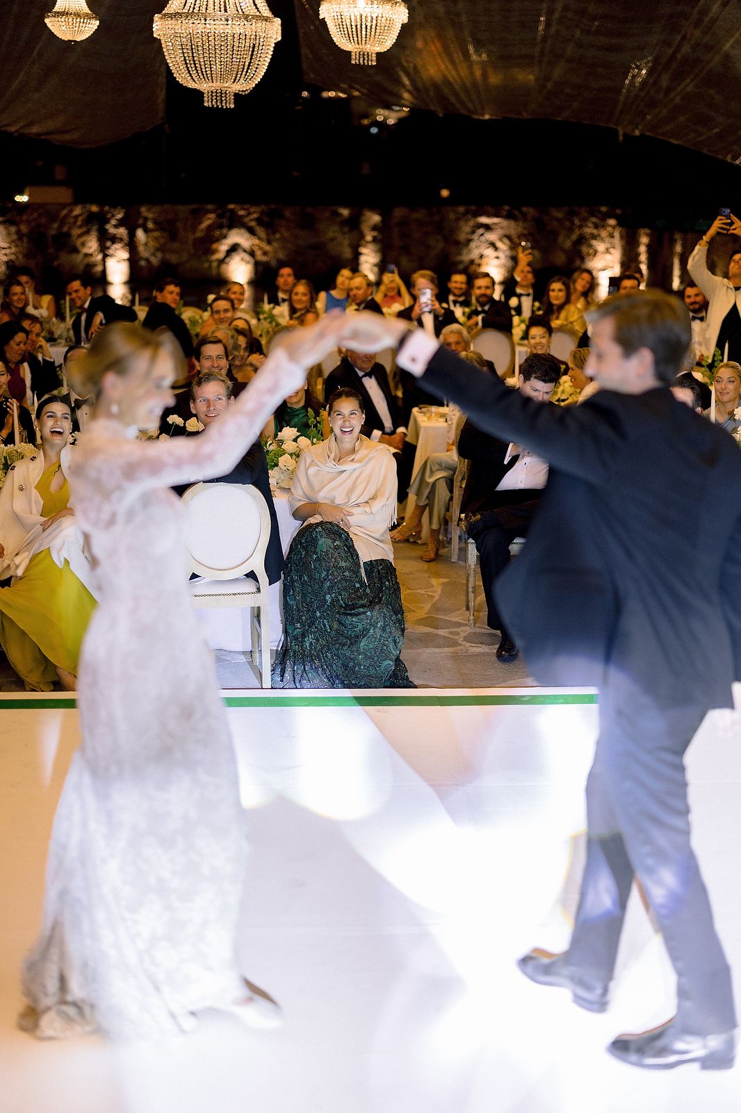 Couple spinning on dance floor at San Miguel de Allende wedding