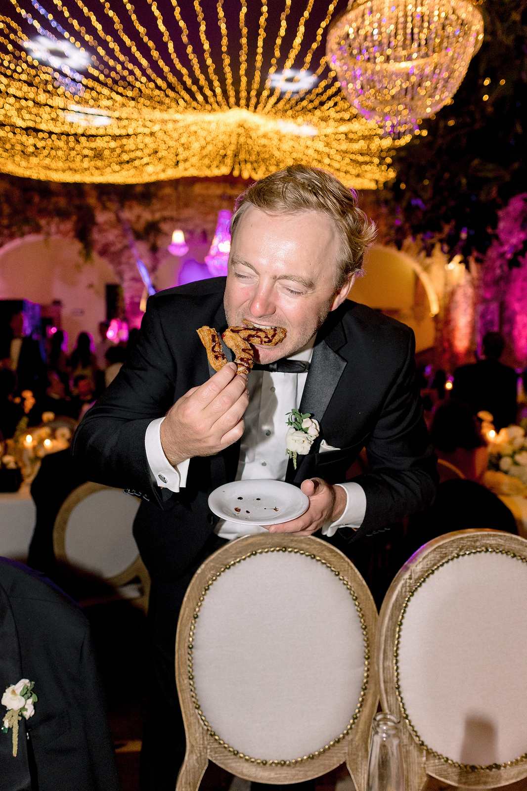 Wedding guest enjoying food at San Miguel de Allende reception
