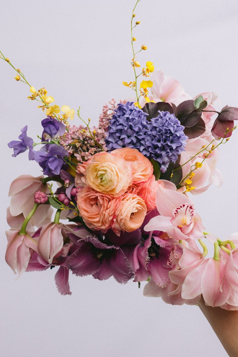 Wedding detail shot invitation suite and florals