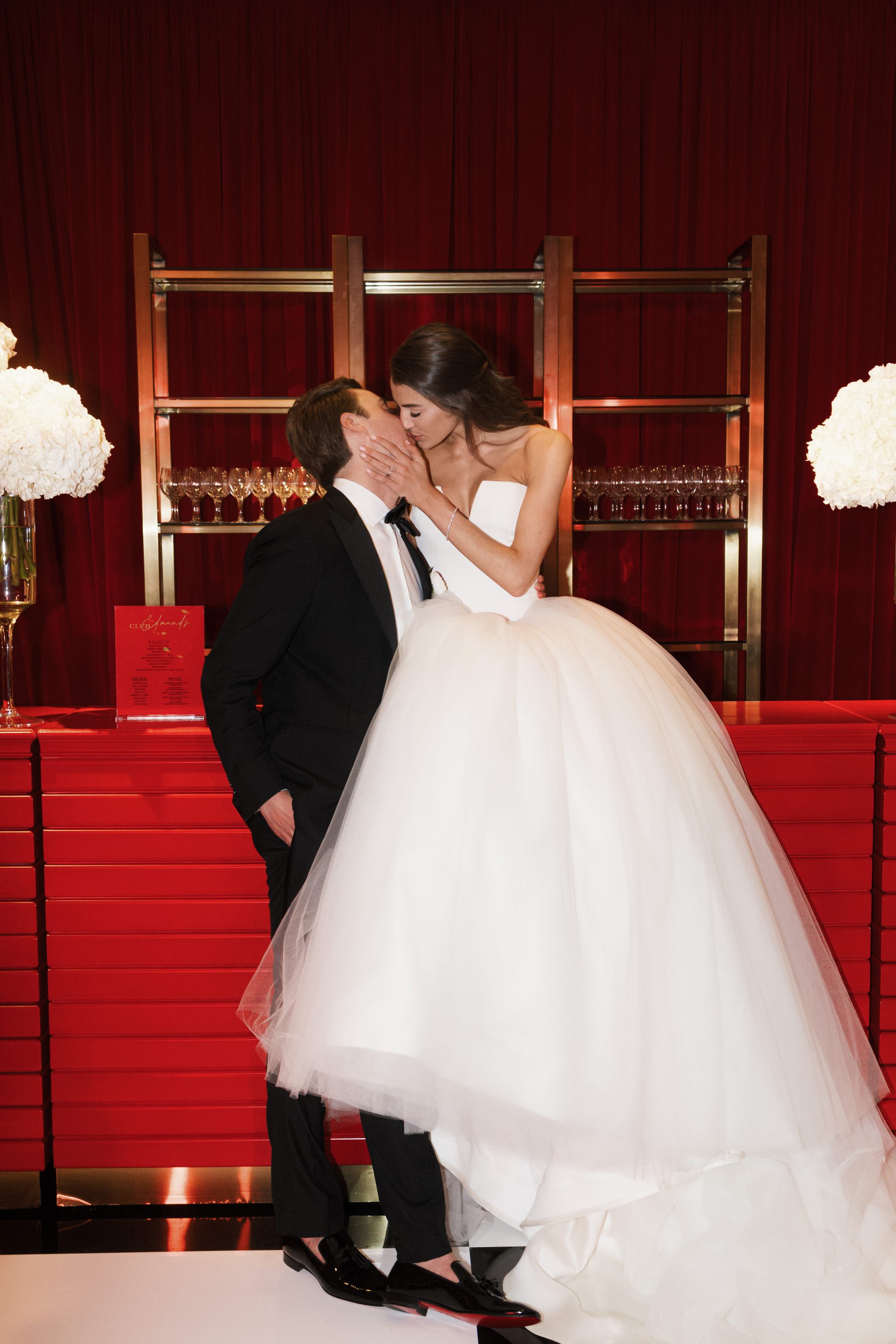 Bride and groom walking through Houstonian Hotel gardens Houston