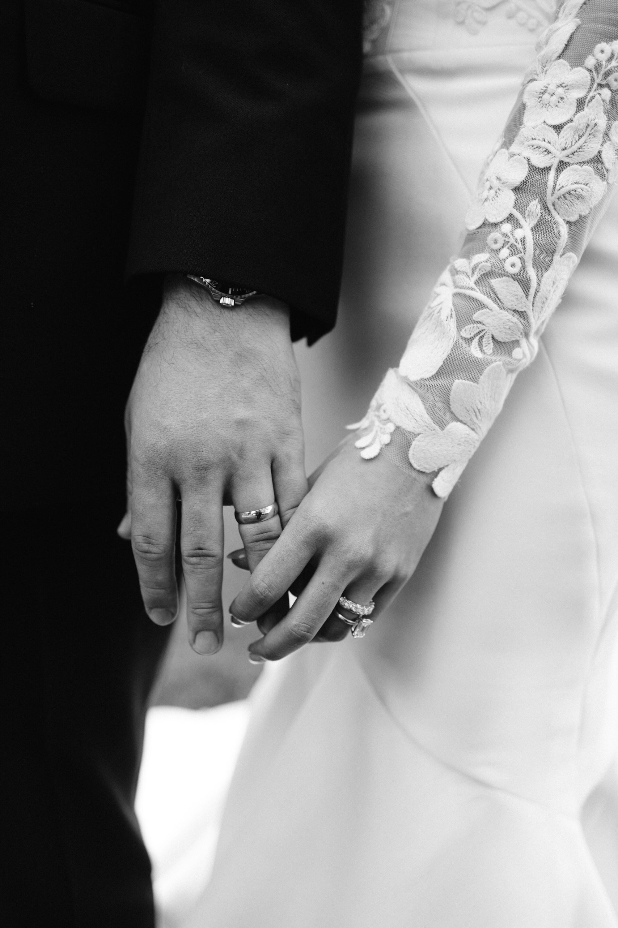 Hands intertwined at Tuscany wedding
