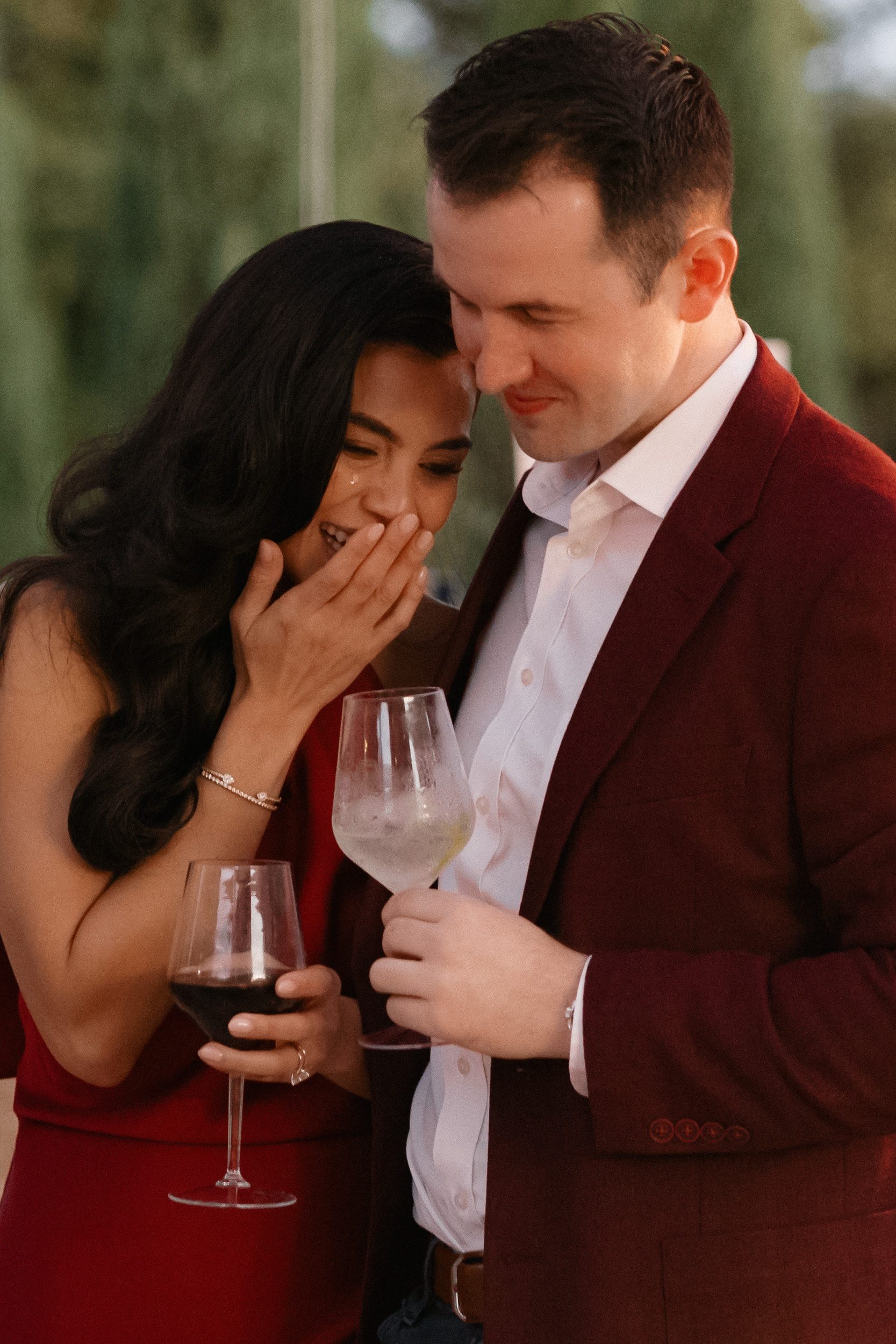 Rolling hills of Tuscany behind wedding couple at Ombroneta Estate