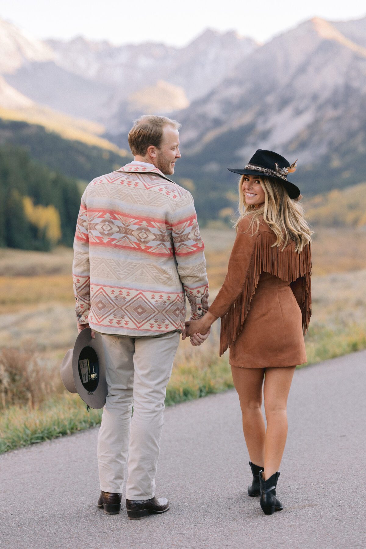 Close-up engagement portrait among fall foliage Aspen Colorado