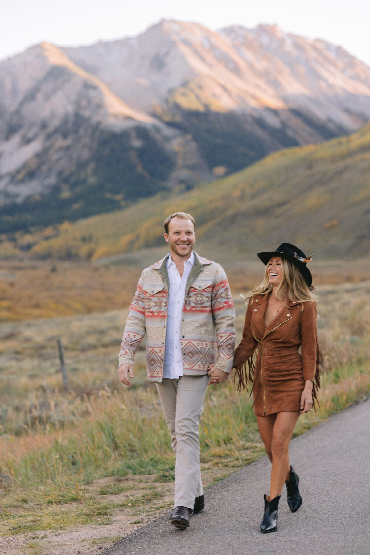 Portrait among golden aspens fall engagement session Aspen Colorado