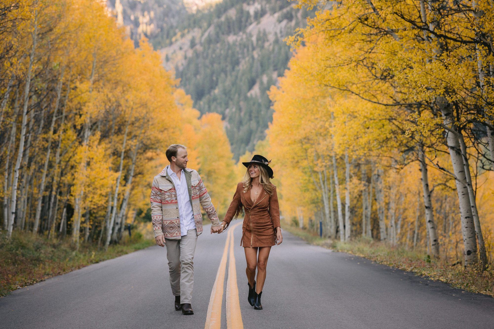 Fall color panorama engagement portrait Elk Mountains Aspen Colorado