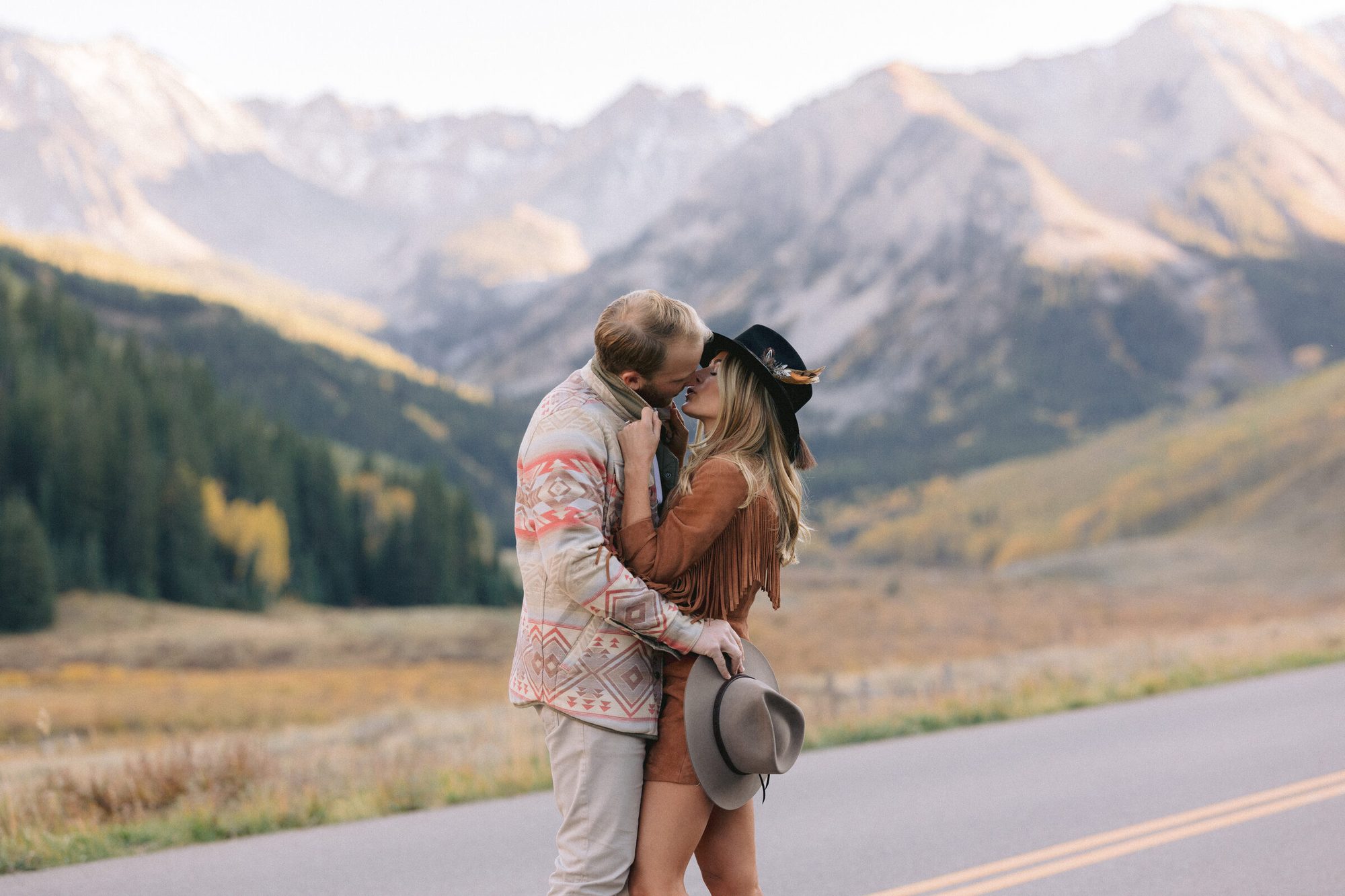 Mountain panorama with golden aspens during Aspen Colorado engagement session