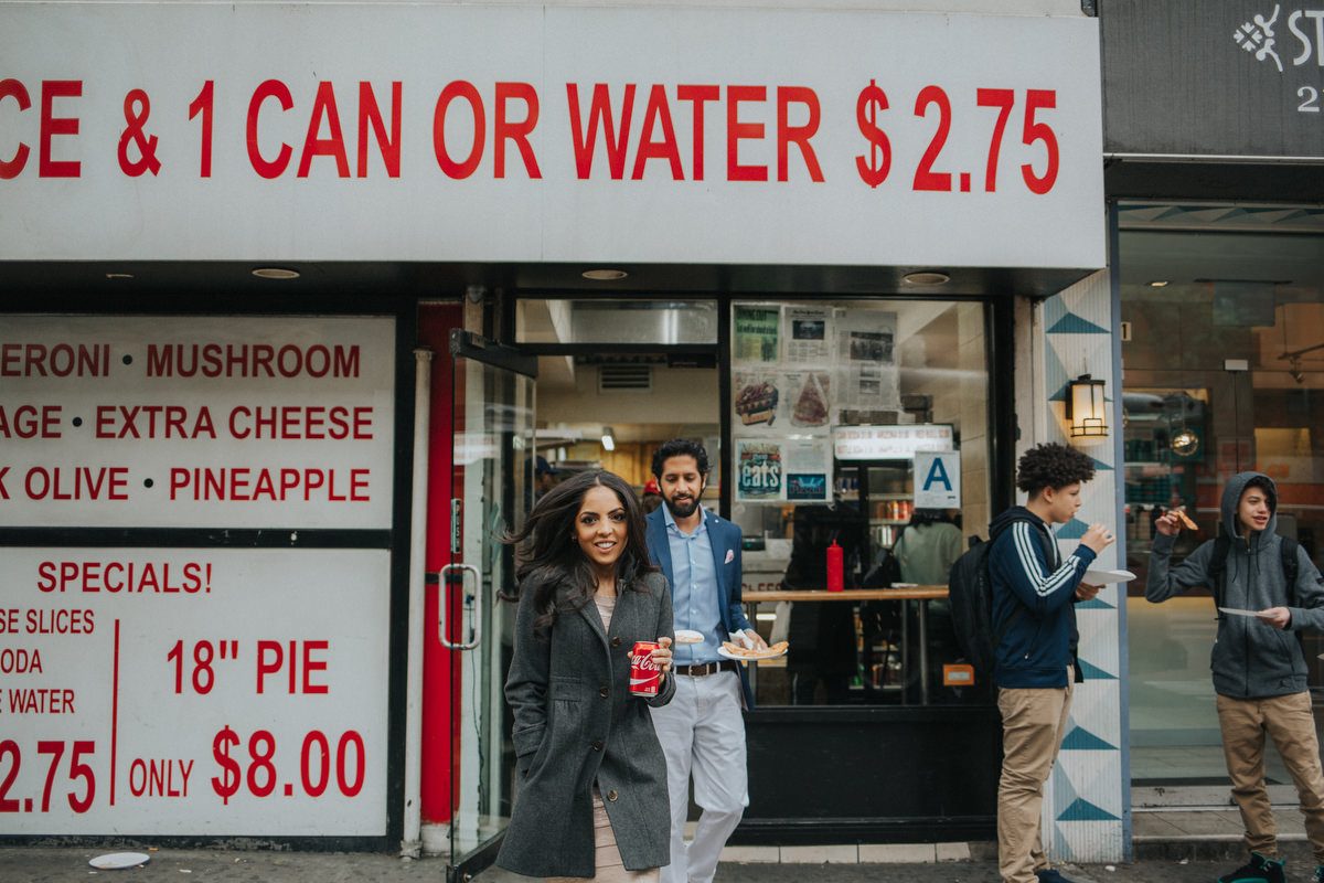 Kavita and Amit at an iconic DUMBO Brooklyn location with the Manhattan Bridge during their NYC engagement session by Marco Wang Photography