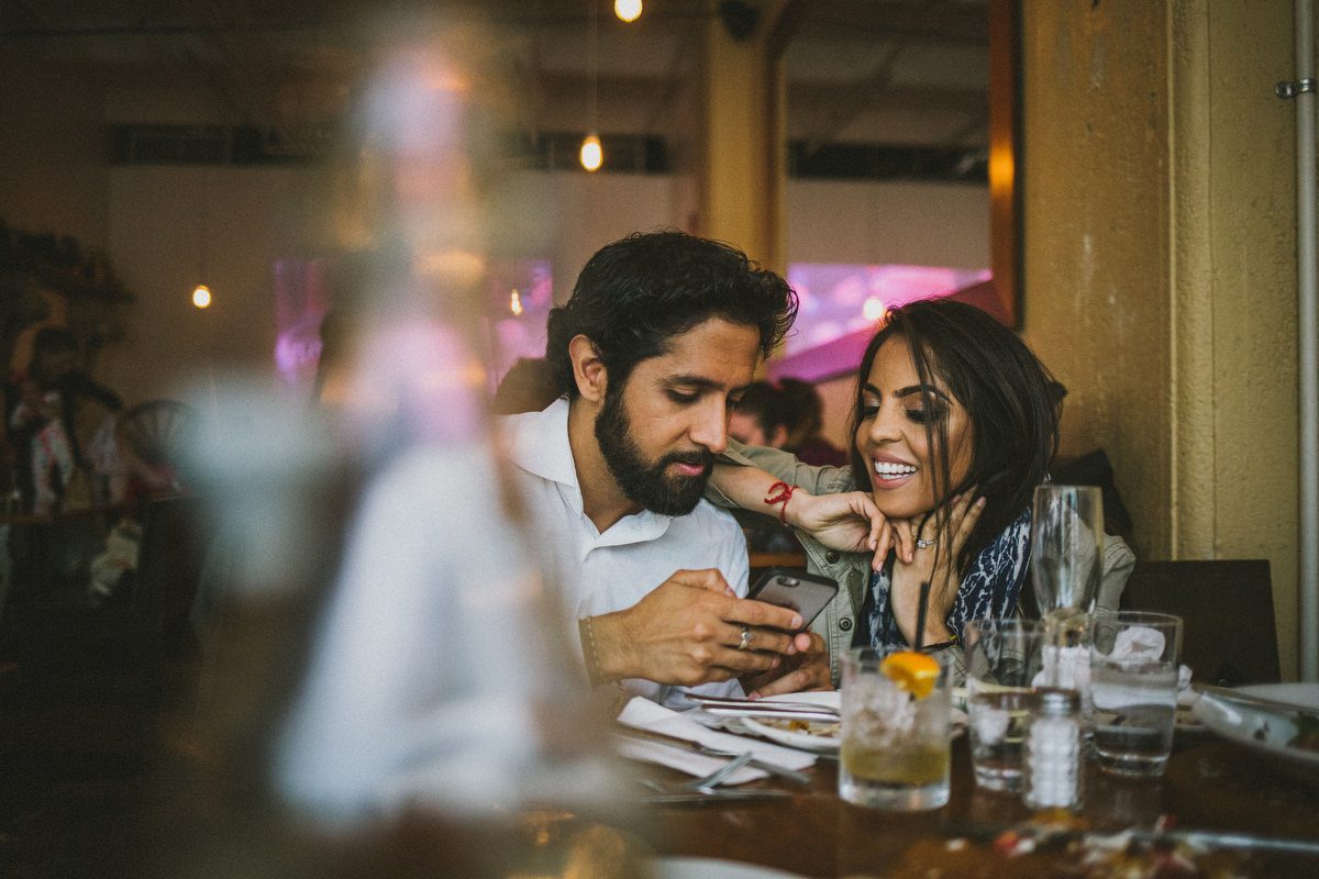 Kavita and Amit sharing a romantic moment in Central Park during their New York City engagement session by Marco Wang Photography