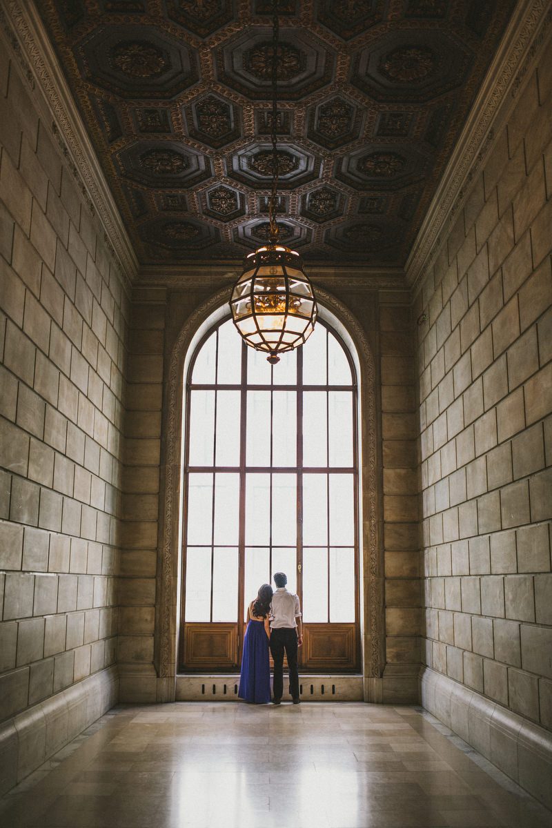 Kavita and Amit portrait on the streets of Manhattan during their New York City engagement session by Houston photographer Marco Wang