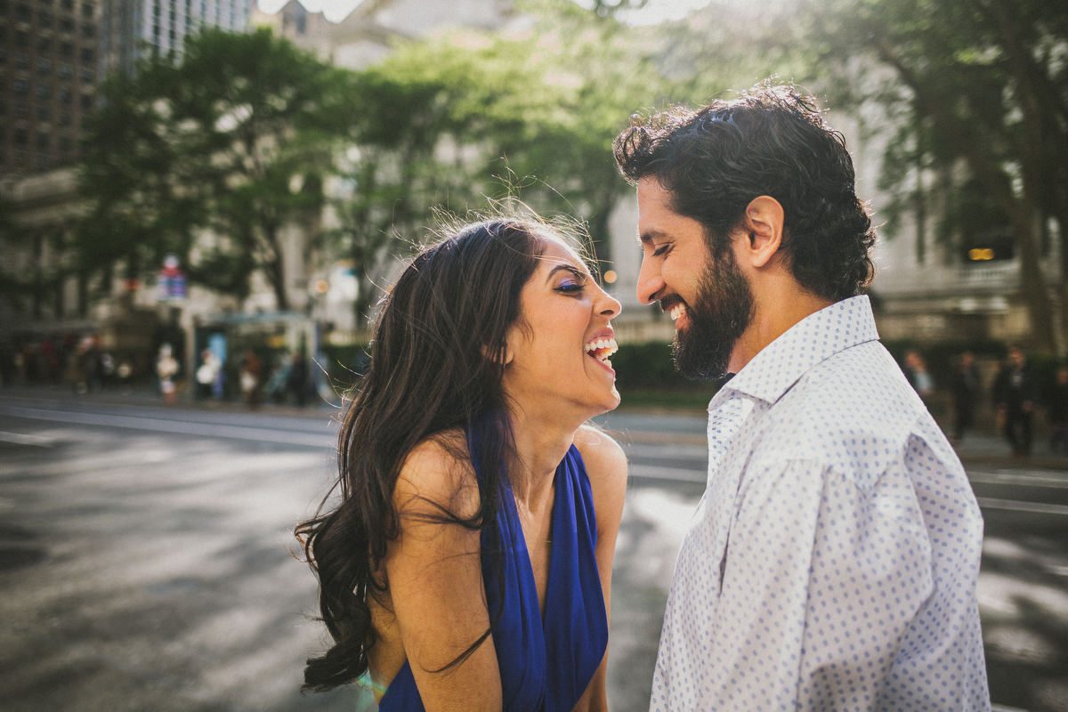 Kavita and Amit laughing on NYC street