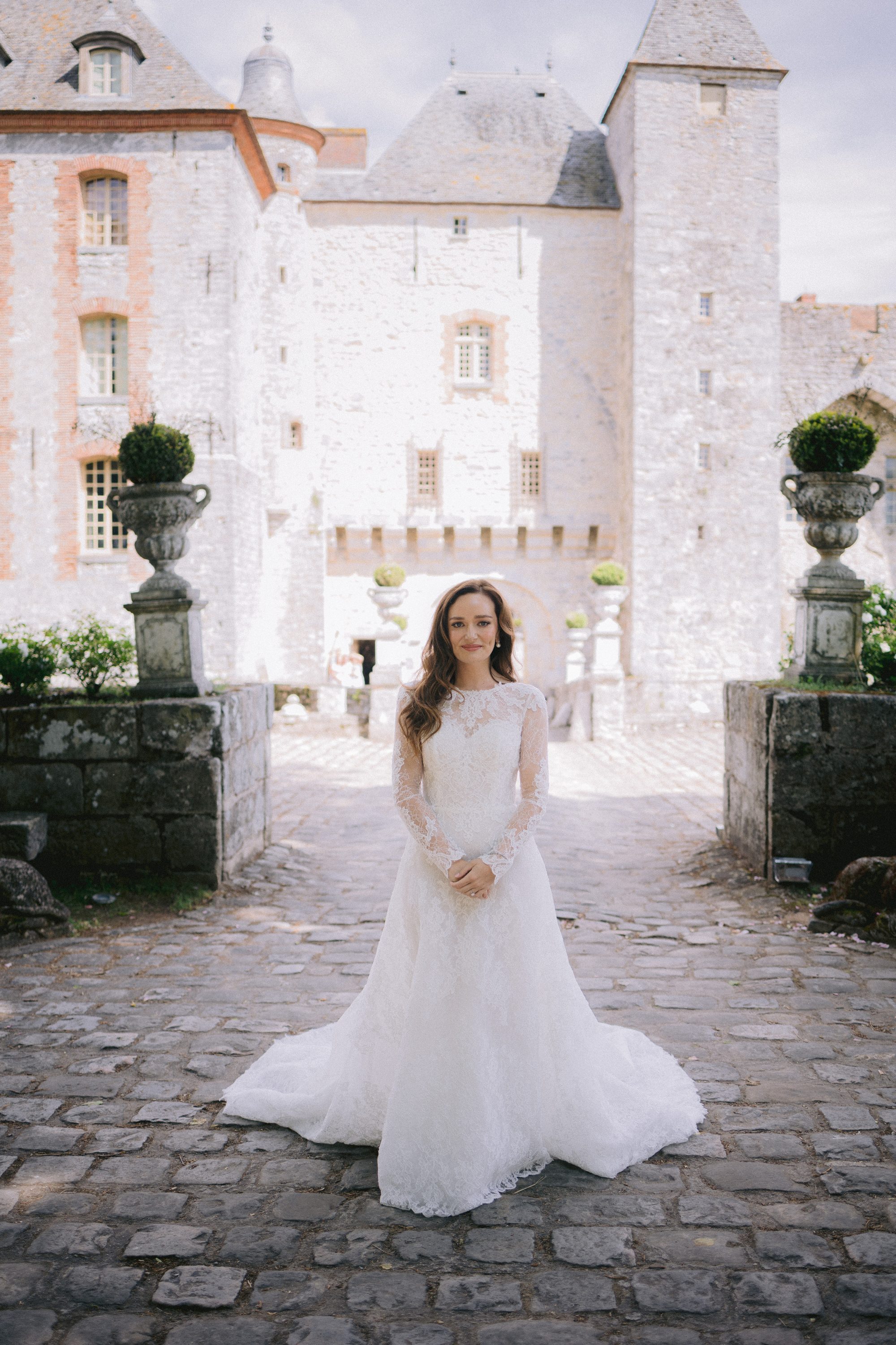 Bride portrait at Chateau de Farcheville facade France destination wedding