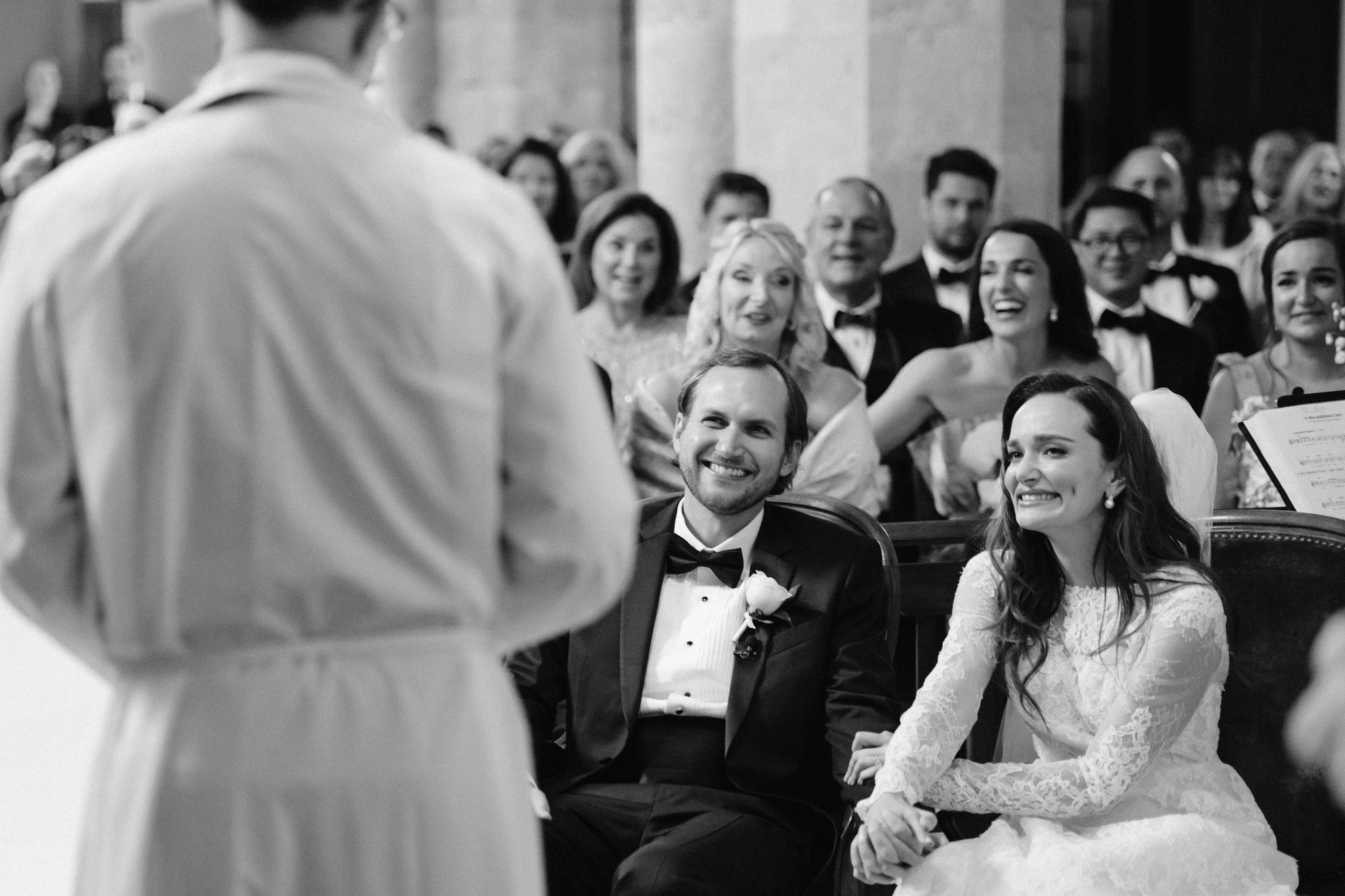 Bride walking down the aisle at French church ceremony destination wedding