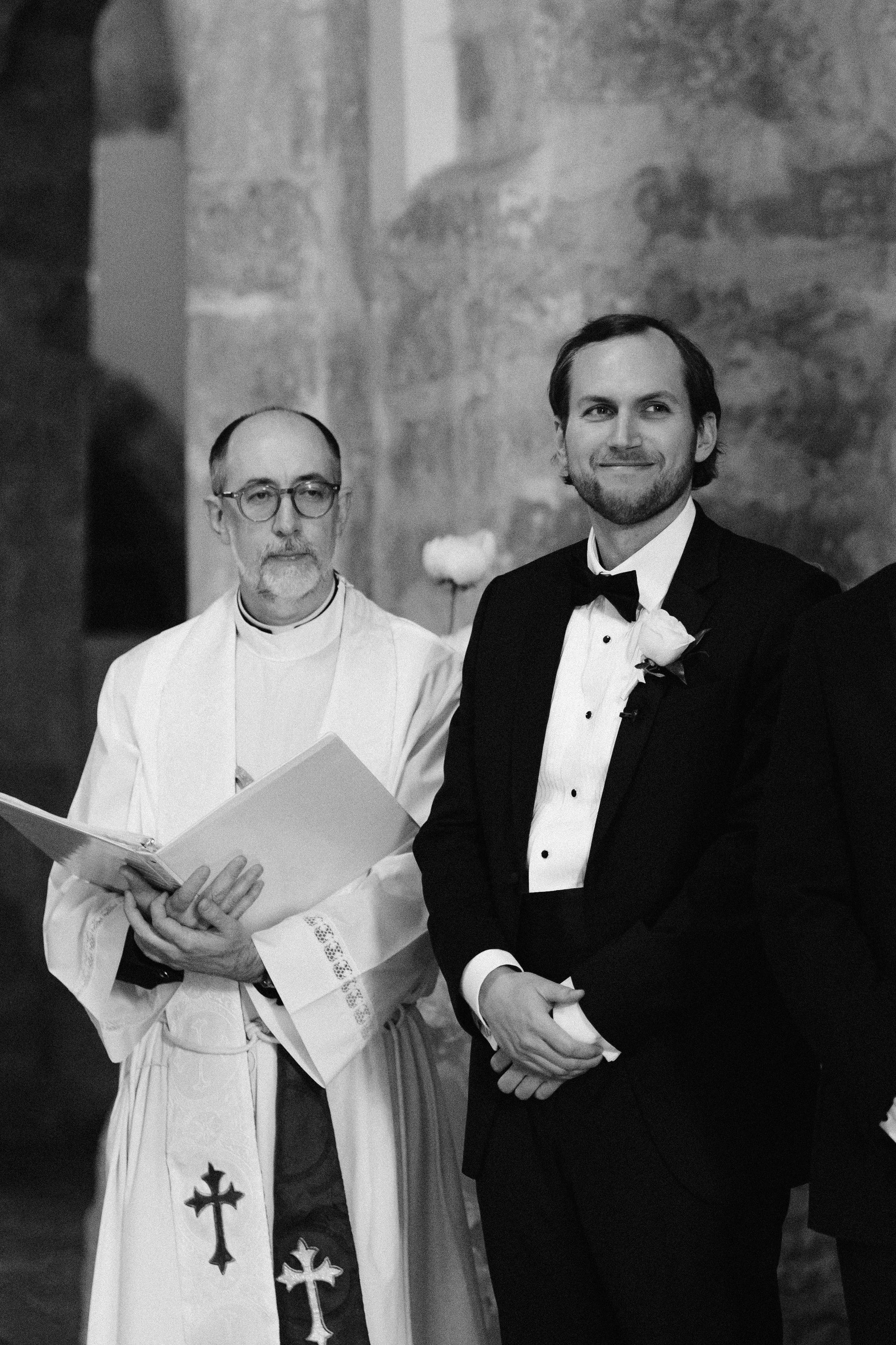 Bride and father entering church ceremony near Chateau de Farcheville France