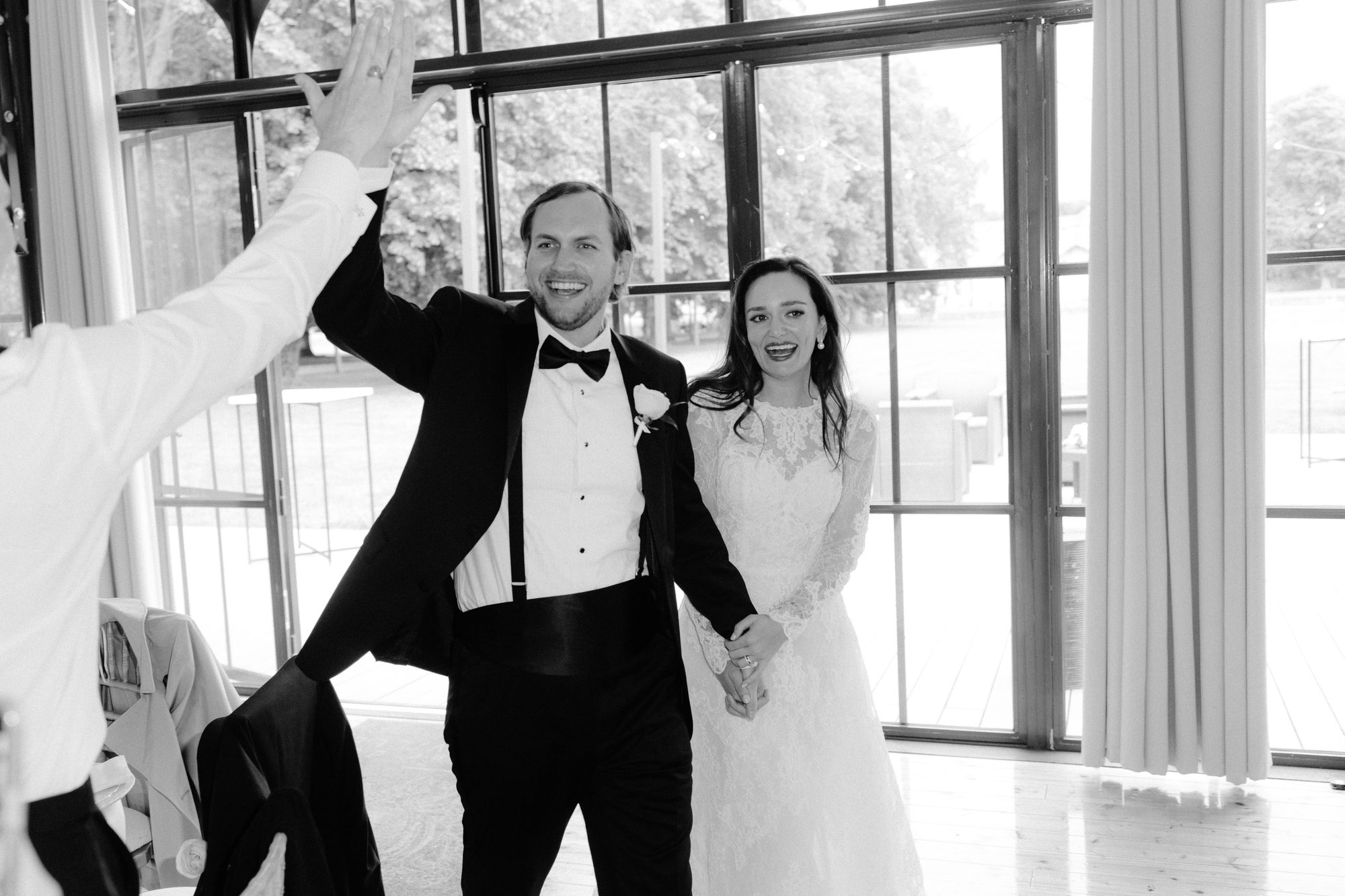 Couple grand entrance to reception at Chateau de Farcheville France