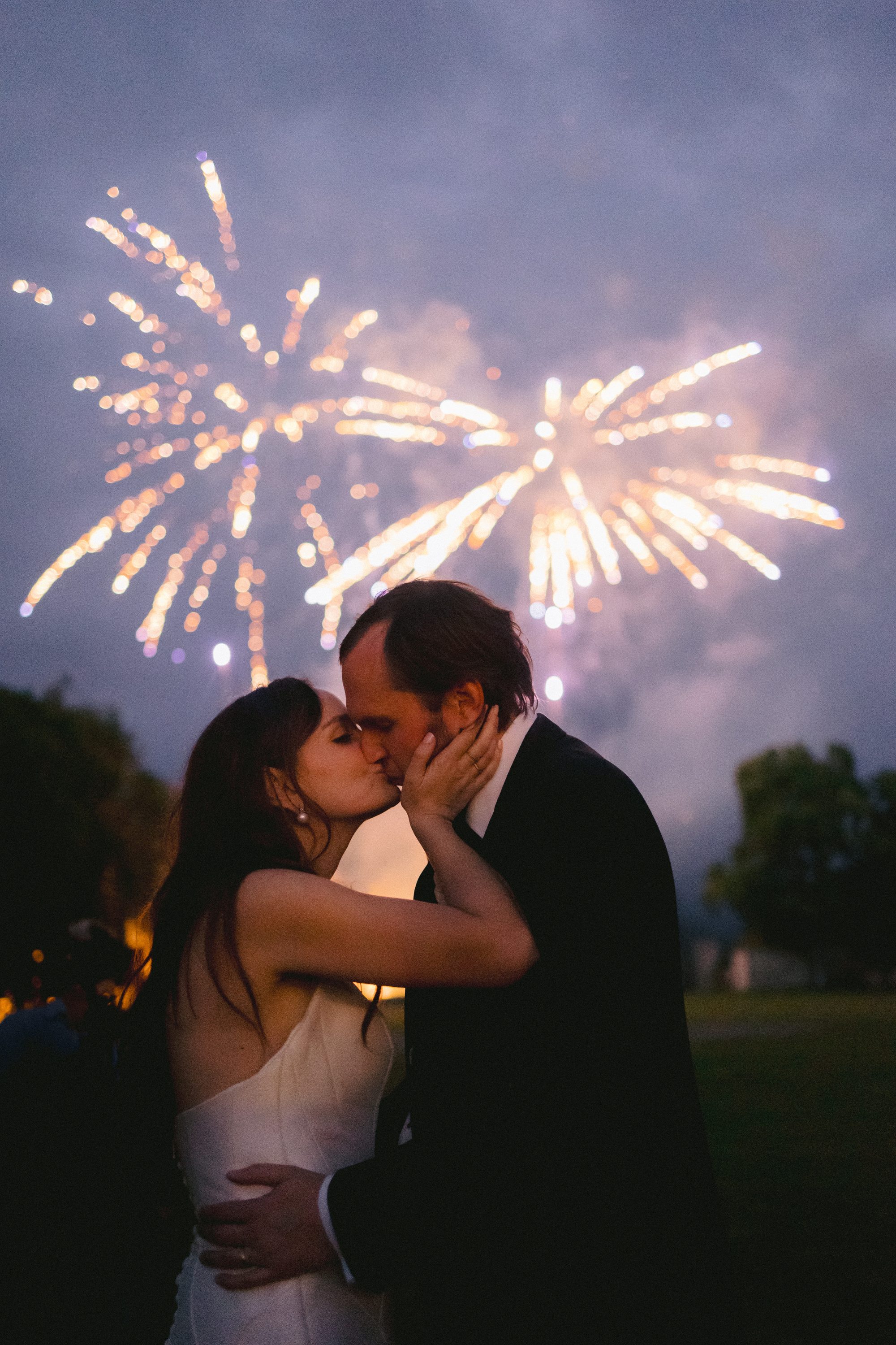 Rachael and Davis fireworks kiss