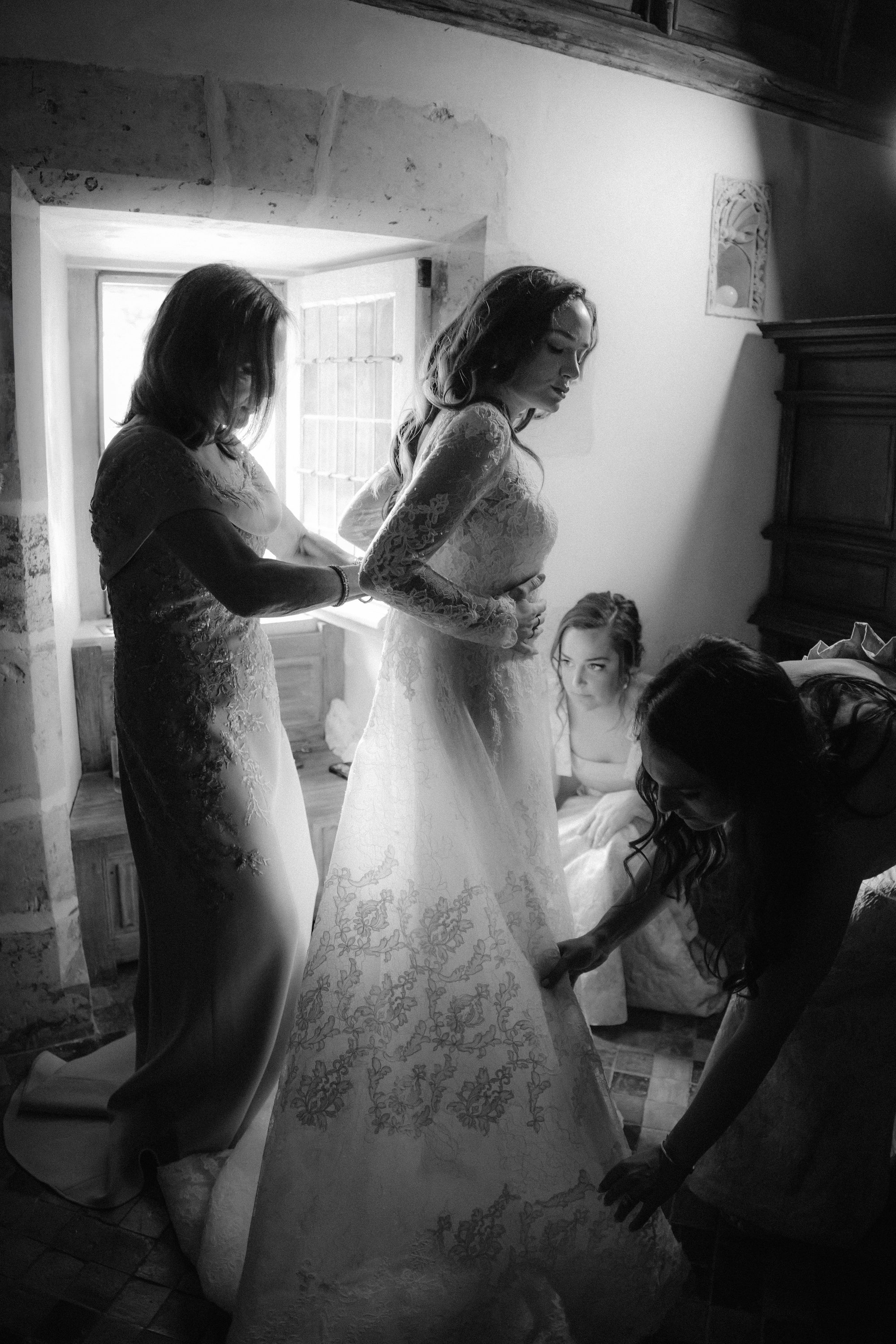 Bride getting ready at Chateau de Farcheville France destination wedding photographer Marco Wang